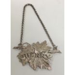 A Victorian silver Sherry label with leaf decorati