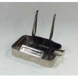 CARTIER: A modern silver ashtray of rectangular fo