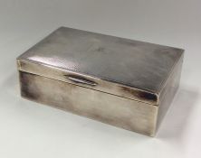 A heavy silver engine turned cigarette box. Birmin