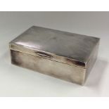 A heavy silver engine turned cigarette box. Birmin