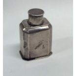 A small Georgian silver caddy with cut corners and