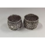 A pair of heavy Indian silver napkin rings decorat