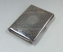 An Edwardian silver wallet with fitted interior en