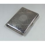 An Edwardian silver wallet with fitted interior en