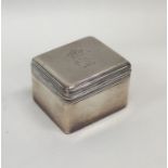 A heavy rectangular hinged top silver box. London.