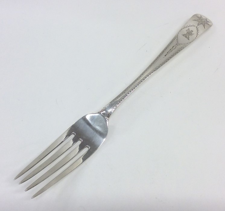 DUBLIN: An Irish Georgian silver bright cut fork.