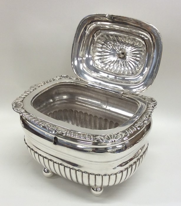 A Georgian silver half fluted tea caddy on ball fe - Image 2 of 3