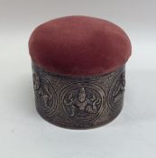 An unusual Indian silver pin cushion mounted with
