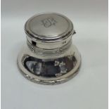 A novelty silver inkwell complete with watch mount