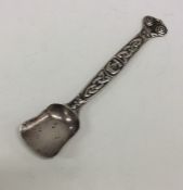 IONA: A large silver sugar scoop with tapering han