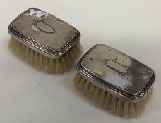 A pair of plain silver hairbrushes. Approx. 95 gra