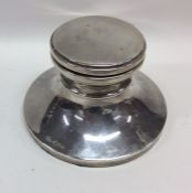 A circular hinged top silver capstan inkwell. Birm