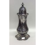 A tall baluster shaped silver sugar caster. Birmin