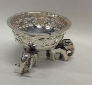 A heavy Indian silver salt decorated with elephant