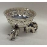 A heavy Indian silver salt decorated with elephant