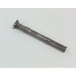 A silver engine turned extending pencil. Approx. 1