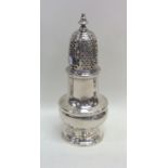 A good Georgian silver caster with lift-off cover