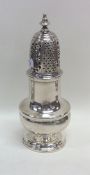 A good Georgian silver caster with lift-off cover