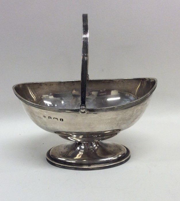 An Edwardian silver sugar basket on oval base. App