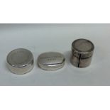 Three heavy silver pill boxes. Approx. 73 grams. E