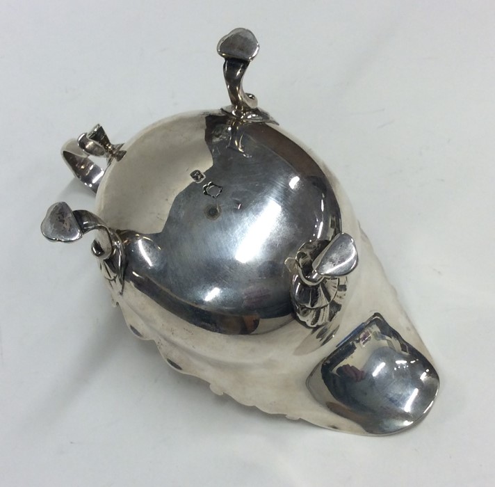 A Georgian silver sauce boat with card cut rim. Lo - Image 2 of 2