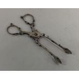 A pair of Georgian silver sugar scissors. Approx.
