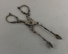 A pair of Georgian silver sugar scissors. Approx.