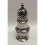 A small Georgian silver baluster shaped caster. Lo
