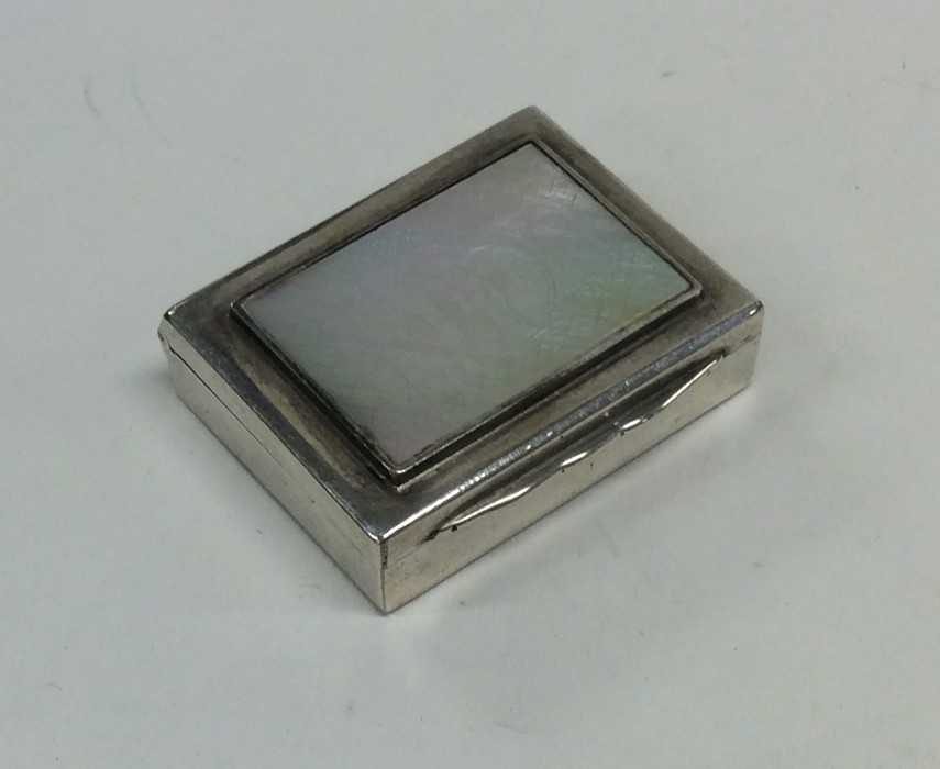A good quality rectangular silver and MOP hinged t