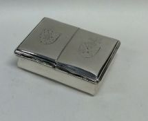 A rare double sided hinged top silver snuff box wi