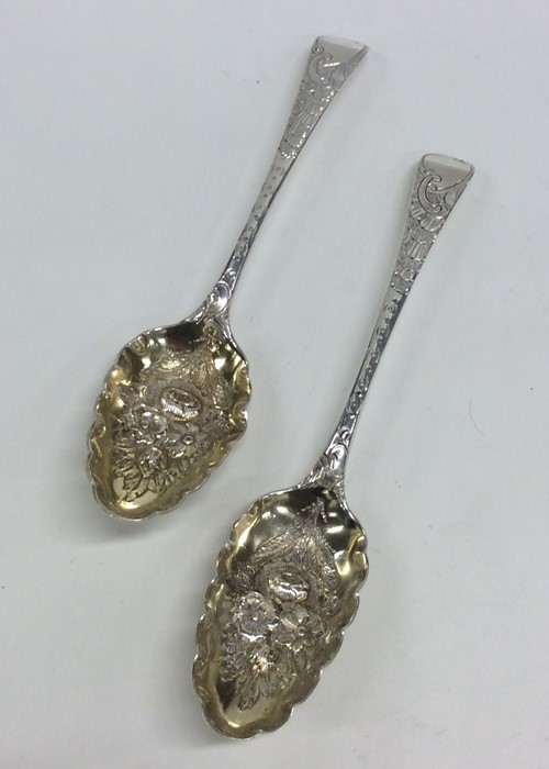 A pair of Georgian silver OE pattern berry spoons
