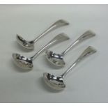 A set of four silver OE pattern cream ladles. Shef