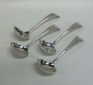 A set of four silver OE pattern cream ladles. Shef