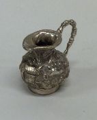 A novelty Chinese silver miniature ewer. Punched '