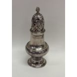 A Georgian silver baluster shaped sugar caster. Lo