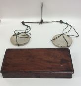 A good pair of Georgian silver chemist scales with