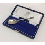A good quality boxed silver anointing spoon. Londo