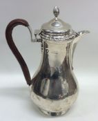 A good quality Edwardian hinged top silver water j
