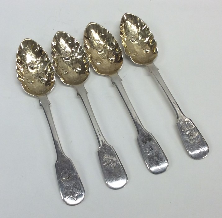 A set of four fiddle pattern berry spoons engraved