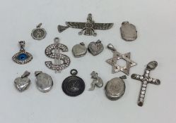 A bag containing silver pendants etc. Approx. 79 g