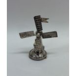 A novelty model of a windmill. Approx. 16 grams. E