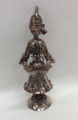 A Continental silver model of a lady with bells. A