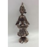 A Continental silver model of a lady with bells. A