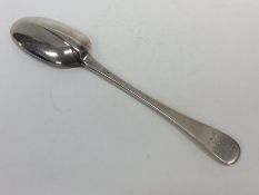 A Georgian silver Hanoverian pattern tablespoon. L