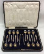 A boxed set of twelve silver coffee spoons togethe