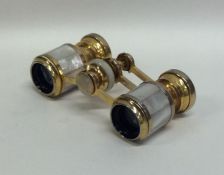 A pair of MOP mounted opera glasses. Est. £20 - £3