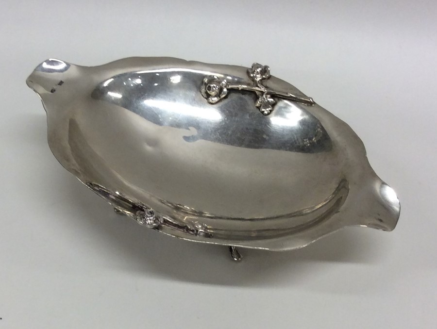 A stylish Continental silver bonbon dish decorated