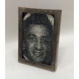 An engine turned rectangular silver picture frame.