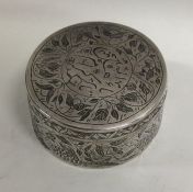 A circular Islamic pill box attractively decorated