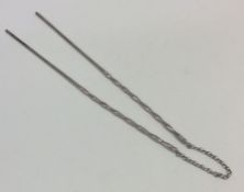 A pair of Chinese silver chopsticks with suspensio